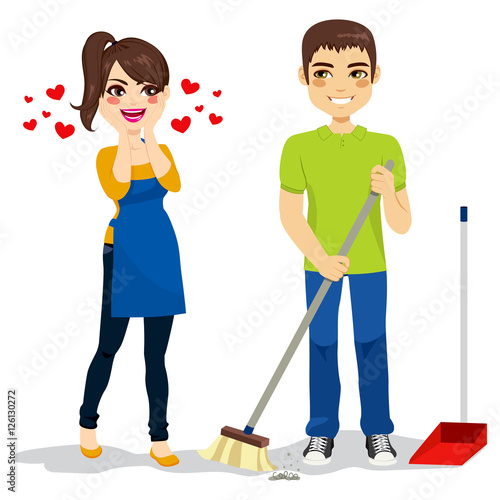 Happy surprised woman loves boyfriend cleaning floor with sweeper