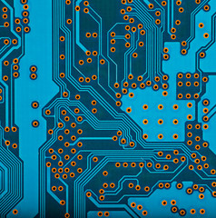 Wall Mural - blue circuit board background of computer motherboard