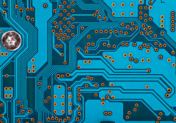 Wall Mural - blue circuit board background of computer motherboard