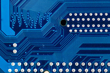 Wall Mural - blue circuit board background of computer motherboard