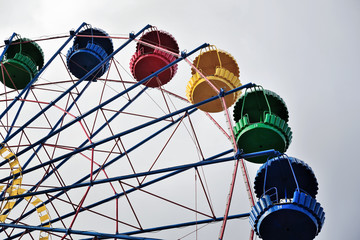 Wall Mural - Ferris wheel on the background of blue sky