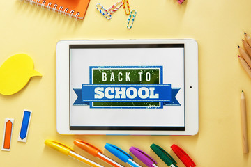 Poster - Colourful stationery and tablet with BACK TO SCHOOL phrase on beige background