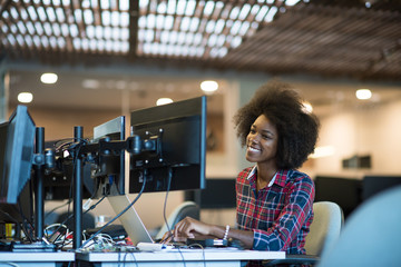 young black woman at her workplace in modern office