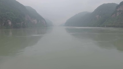 Wall Mural - steep mountain cliffs aerial view, yangtze river china