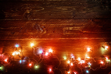 Wall Mural - christmas lights background - rustic merry christmas (xmas) background with plank wood with colorful