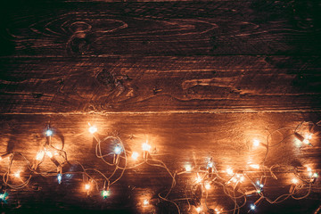 Wall Mural - christmas lights background. merry christmas (xmas) background. old wood texture - vintage styles