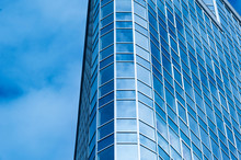 Image Of Modern Office Building Against Cloudy Sky