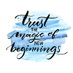 Wall Mural - Trust the magic of new beginnings. Inspiration saying. Vector brush calligraphy on blue watercolor strokes. Encouraging quote about start.