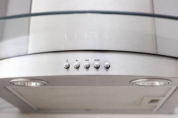 Controls of a white extractor hood