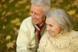 Fototapeta  - Senior couple in autumn park