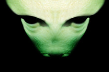 Black Background With Green Alien