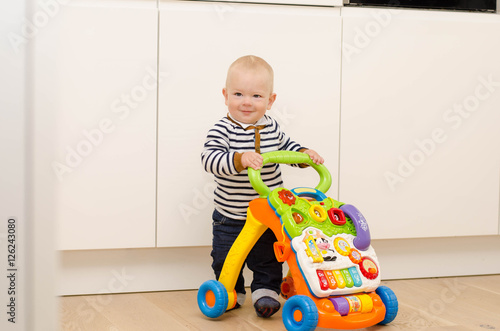 Baby Beim Laufen Lernen Buy This Stock Photo And Explore Similar