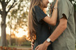© Kike Arnaiz/ADDICTIVE STOCK - Couple looking face to face at sunset.