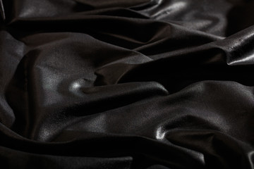 Black satin textile background