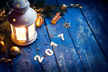 Magical Lantern On Wooden Background With Christmas Decoration