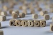 © domoskanonos - Kultur - Holzwürfel mit Buchstaben