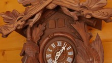 Beautiful Hand Carved Cuckoo Clock On A Wall