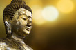 © saksrifotolia - Selective focus point on Buddha statue.