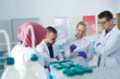 © Myvisuals - group of scientists working at the laboratory