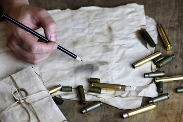 Poster - man write letter retro bullet on the table