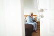 © WavebreakmediaMicro - Worried senior woman sitting on bed
