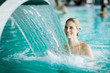 © NDABCREATIVITY - Woman enjoying hydrotherapy in spa pool