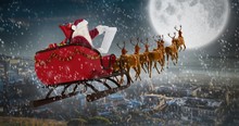 Composite Image Of Santa Claus Riding On Sled During Christmas