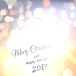 © ket4up - Merry Christmas and Happy New Year 2017. Holiday Vector bokeh background with glow lights.