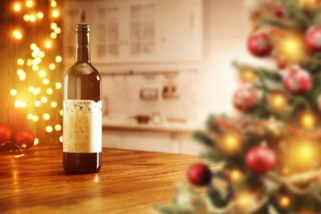 xmas background of kitchen interior and wooden table with wine 