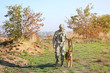 © Africa Studio - Soldier with german shepherd dog at military firing range
