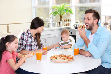 Poster - Happy family eating food on kitchen