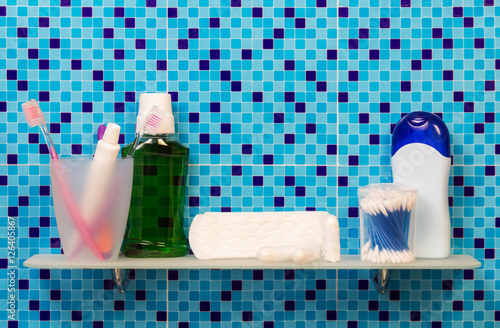 Fotografía Women's hygiene products on shelf in bathroom, background.