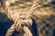 Close up Coil of rope with nature background.Vintage or retro tone.