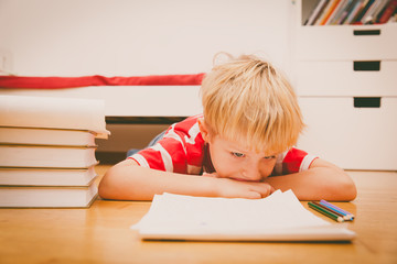 Wall Mural - little boy hates doing homework