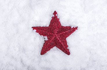 Wall Mural - red star placed in snow