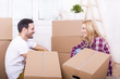 © Drpixel - Young couple moving in to new home together. Home, people, moving and real estate concept