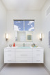 © coralimages - Modern bathroom with single modern glass sink.