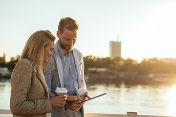 Colleagues talking outdoors