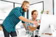 © Sergey Nivens - Two office workers at the desk