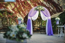 Purple White Wedding Arch Otdoor Background Leaves Wall