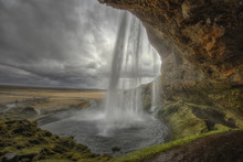 Waterfall Cascading Above Rocks, Iceland