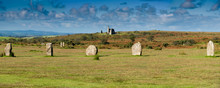 Part Of The Hurlers Stone Circle With An Abandoned Mine Building Near Minions In Bodmin Moor In Cornwall.