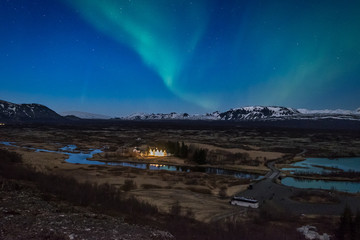 Wall Mural - aurora borealis over the thingvellir national park - iceland