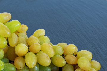Wall Mural - grapes on a black background