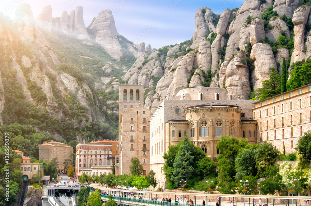Montserrat Monastery, Catalonia, Spain. Santa Maria de Montserrat is a Benedictine abbey located on the mountain of Montserrat. - obrazy, fototapety, plakaty 