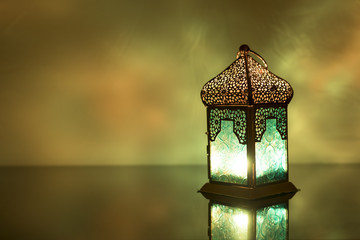 Wall Mural - Low light view of colored Lantern on a glass