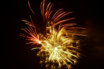 orange yellow fireworks on black background