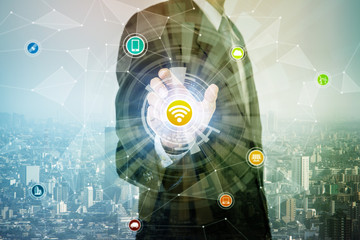 Fototapete - smart city and Internet of Things. business person and technology concept