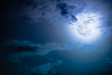 Wall Mural - Nighttime sky with clouds and bright full moon with shiny.