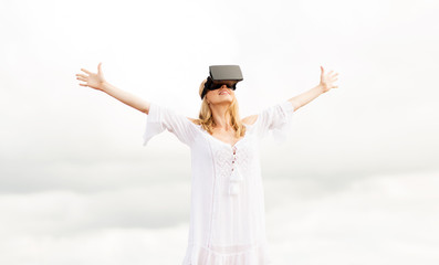 woman in virtual reality headset outdoors